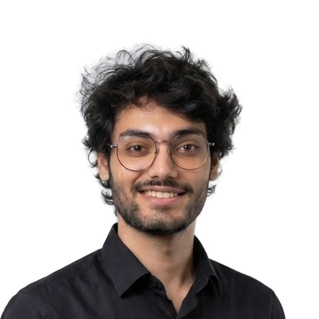 Kaushal Kishor Mishra, from the chest up, in a collared shirt.